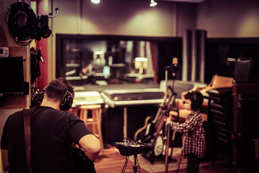 father in studio with child