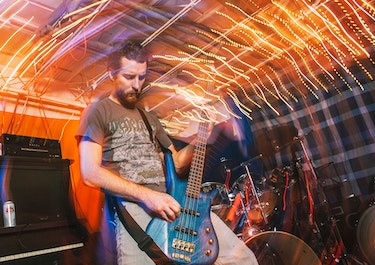 rock guitarist playing guitar intro